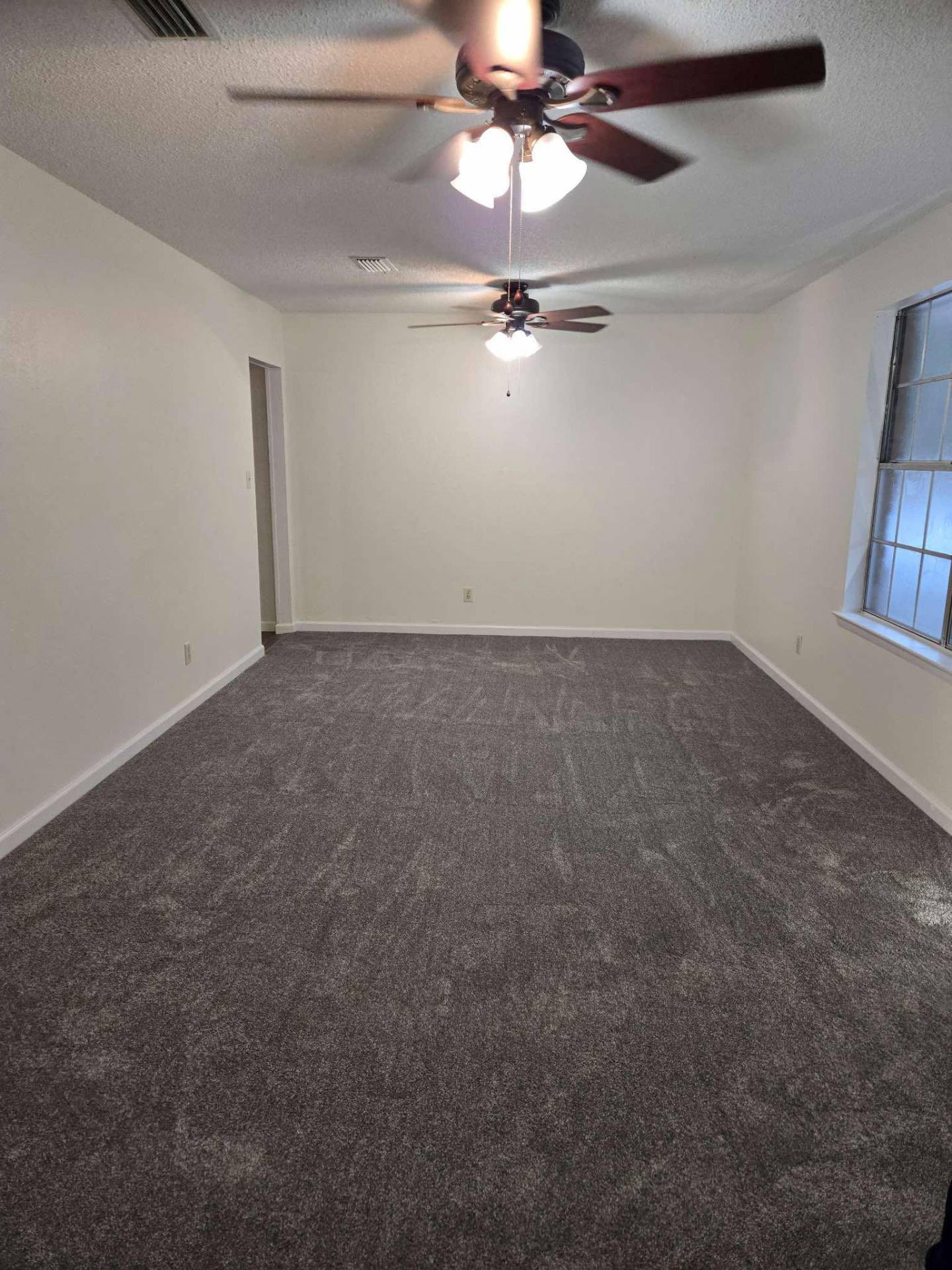 Comfortable bedroom carpet flooring with professional carpet installation in Brent
