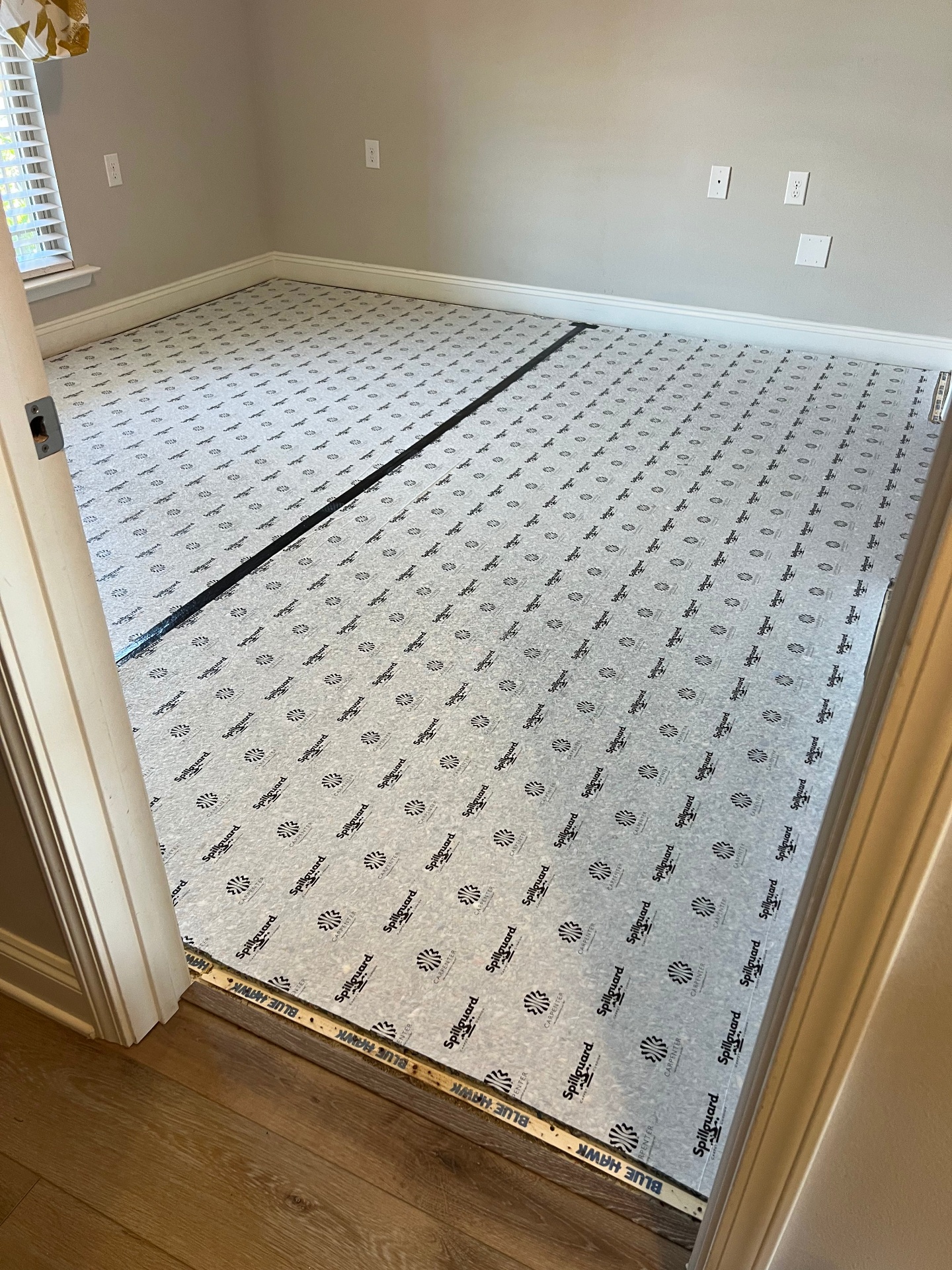 Professional underlayment preparation for carpet flooring in Brent