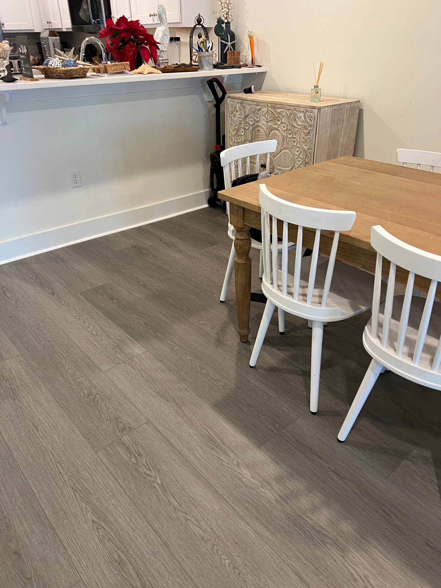 Coastal dining room Flooring Installation with luxury vinyl and ocean views in Pensacola
