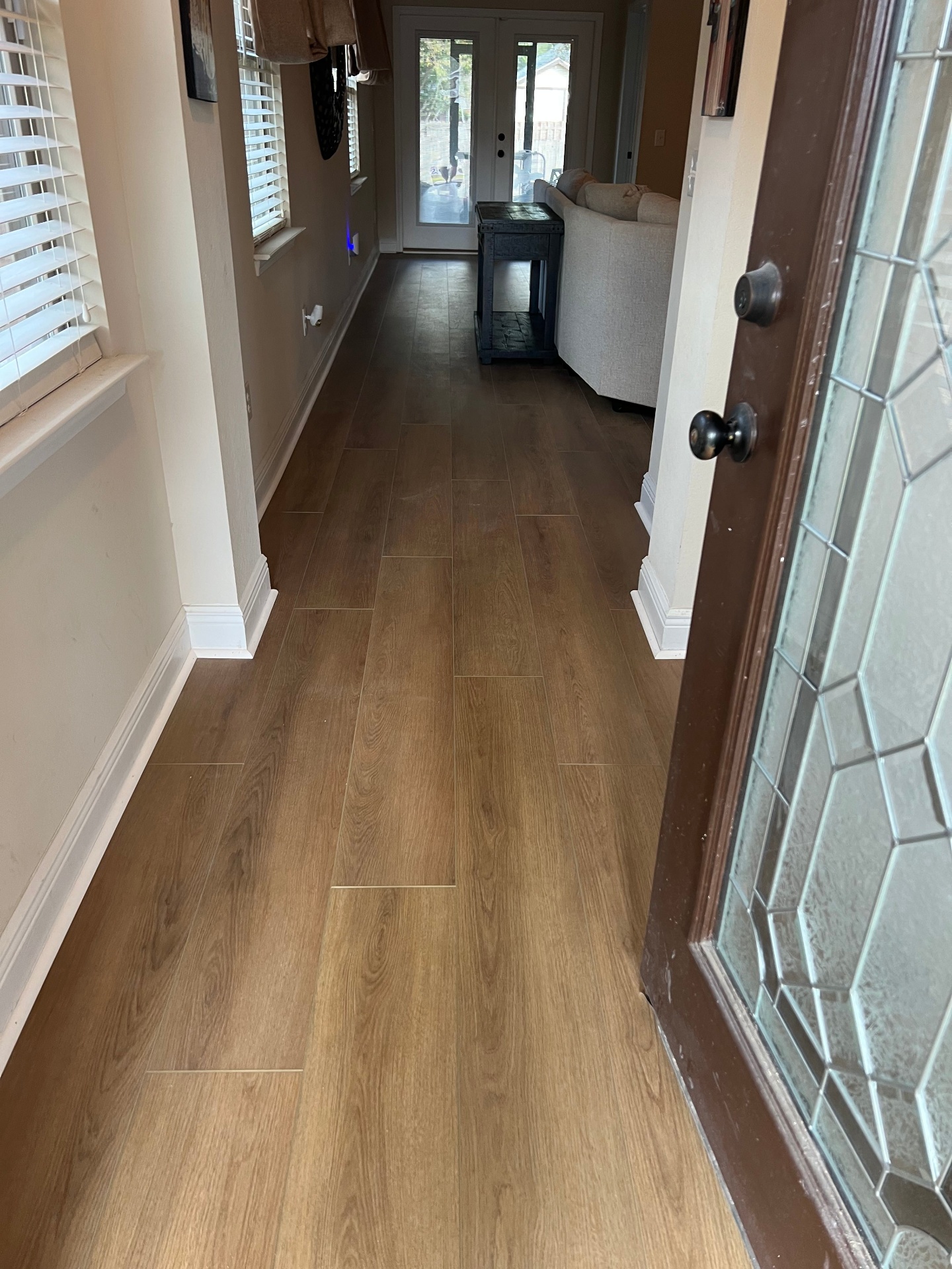 Elegant entryway Flooring Installation with tile-look vinyl flooring in Pensacola