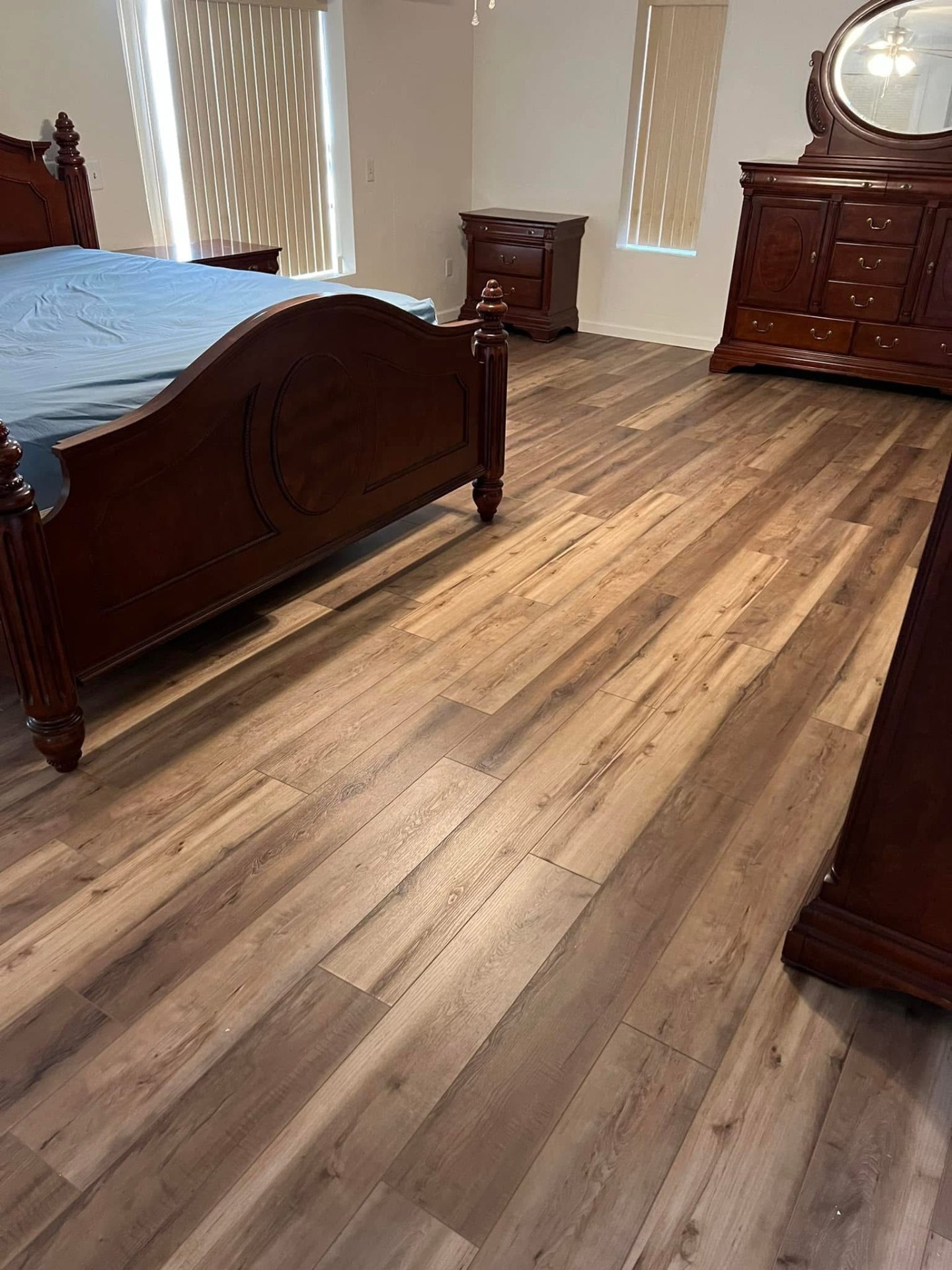Luxurious master bedroom Flooring Installation with premium vinyl plank flooring in Pensacola